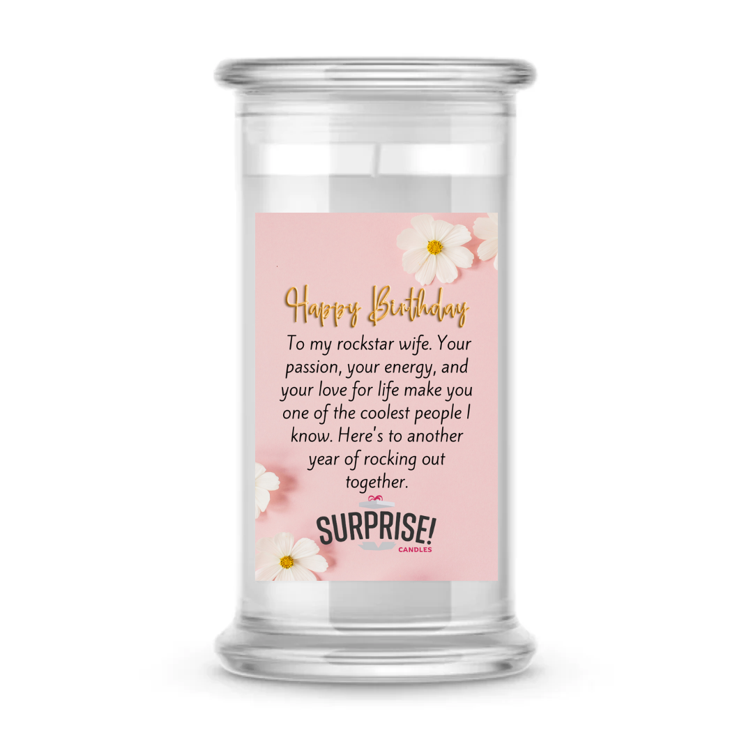 TO MY ROCKSTAR WIFE. YOUR PASSION, YOUR ENERGY AND YOU LOVE FOR LIFE MAKE YOU ONE OF THE COOLEST PEOPLE I KNOW. HERE'S TO ANOTHER YEAR OF ROCKING OUT TOGETHER. HAPPY BIRTHDAY CANDLE