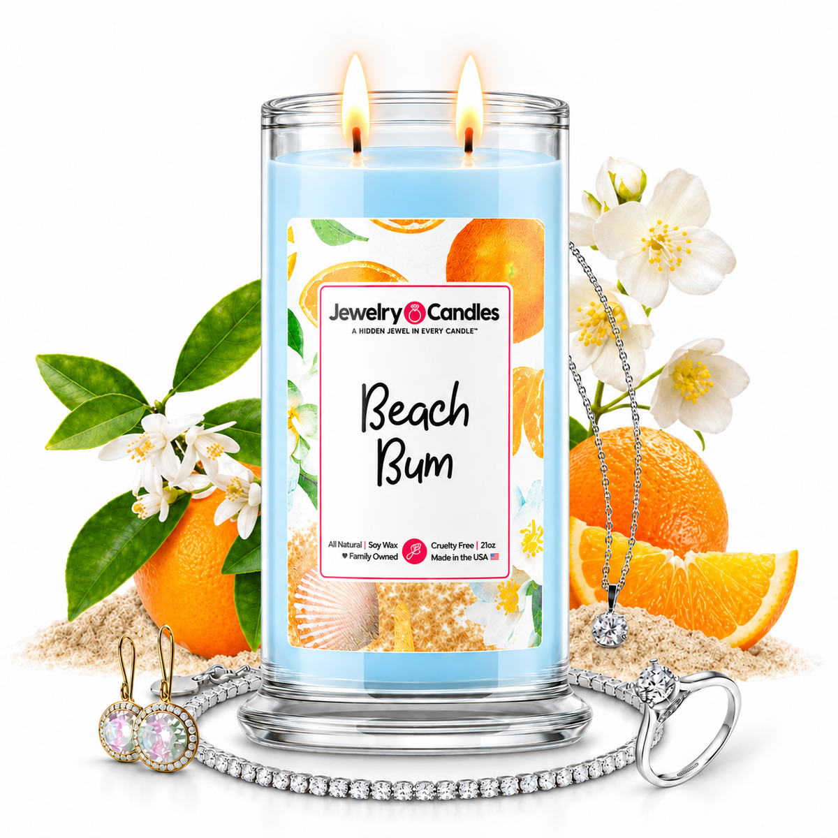 Beach Bum Jewelry Candle with two lit flames and jewelry