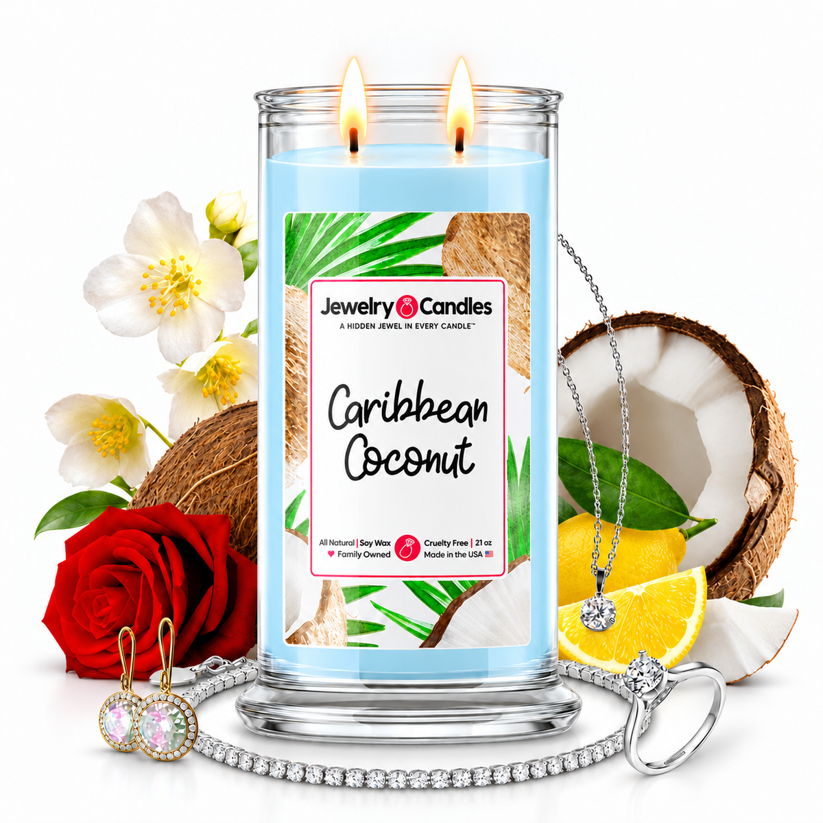 Caribbean Coconut Jewelry Candle with two lit flames and jewelry