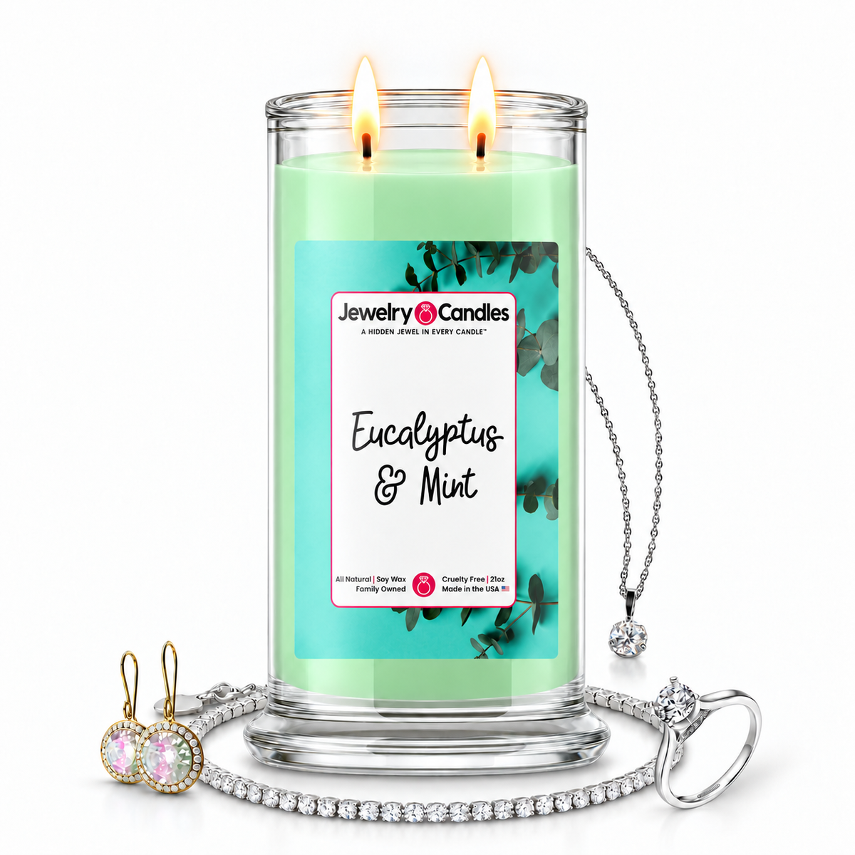 Eucalyptus & Mint Jewelry Candle with two lit flames and jewelry