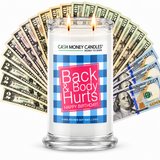 Back And Body Hurts Happy Birthday Cash Money Candle with two lit wicks and a fan of cash