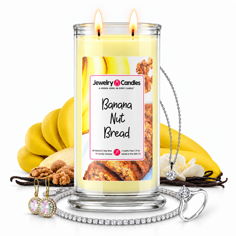 Banana Nut Bread Jewelry Candle with two lit flames and jewelry