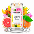 Bedtime Spa Jewelry Candle with two lit flames and jewelry
