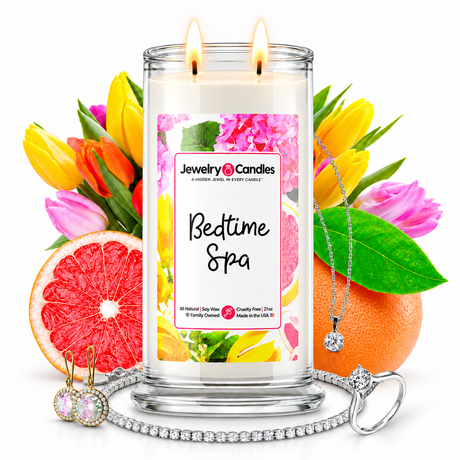 Bedtime Spa Jewelry Candle with two lit flames and jewelry