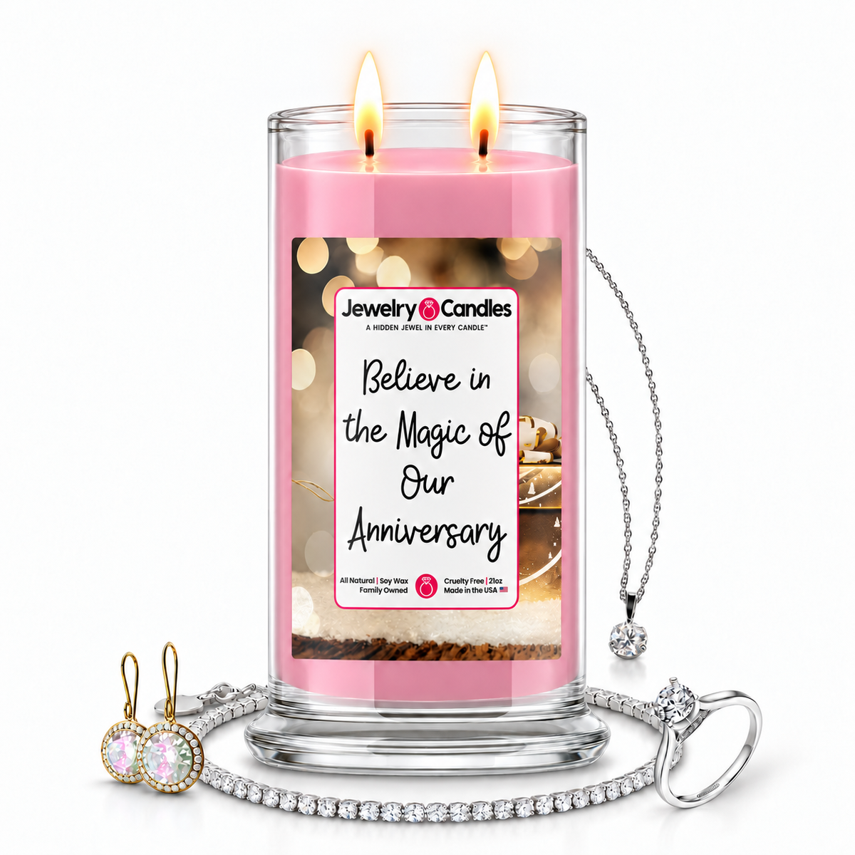 Believe in the Magic of Our Anniversary Jewelry Candle with two lit flames and jewelry