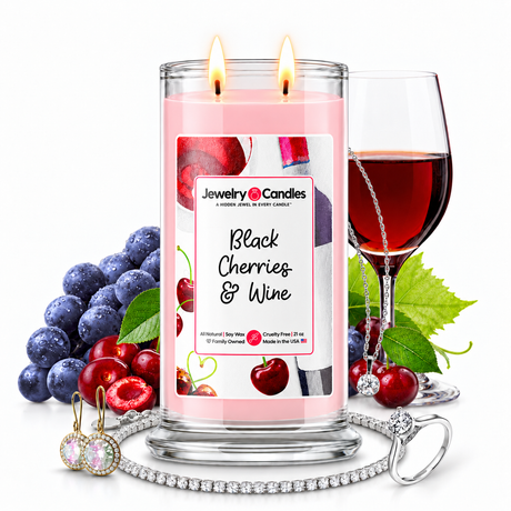 Black Cherries & Wine Jewelry Candle with two lit flames and jewelry