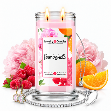 Bombshell Jewelry Candle with two lit flames and jewelry