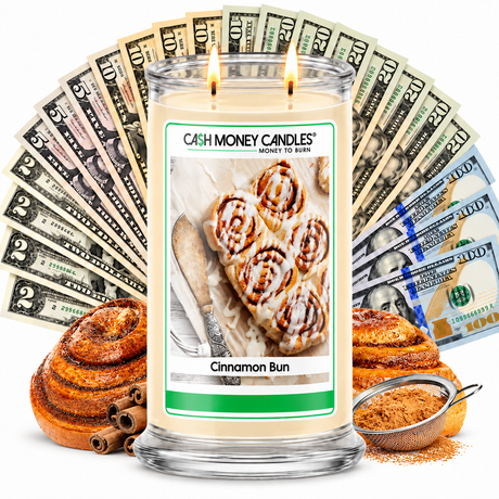 Cinnamon Bun Cash Money Candle with two lit wicks and a fan of cash