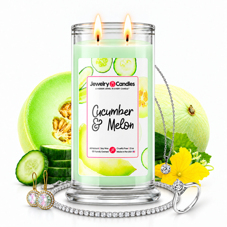 Cucumber & Melon Jewelry Candle with two lit flames and jewelry