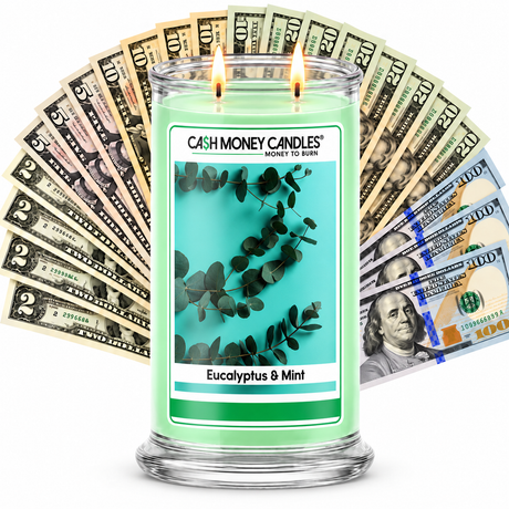 Eucalyptus & Mint Cash Candle with two lit wicks and a fan of cash