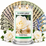 Gardenia Flowers Cash Money Candle with two lit wicks and a fan of cash