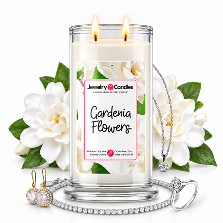 Gardenia Flowers Jewelry Candle with two lit flames and jewelry