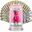 Pretty N' Pink Cash Candle with two lit wicks and a fan of cash