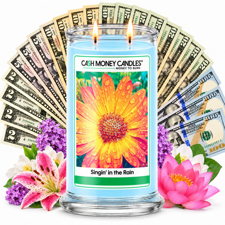 Singin' in the Rain Cash Money Candle with two lit wicks and a fan of cash