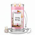 Saturday Mornings Jewelry Candle with two lit flames and jewelry