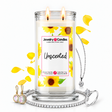 Unscented Jewelry Candle with two lit flames and jewelry