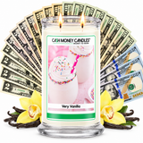 Very Vanilla Cash Money Candle with two lit wicks and a fan of cash