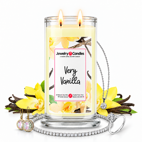 Very Vanilla Jewelry Candle with two lit flames and jewelry