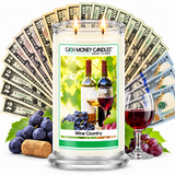 Wine Country Cash Money Candle with two lit wicks and a fan of cash